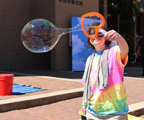Gabriel Homes resident with a bubble wand.
