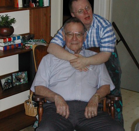 Gabriel Homes resident (back) with their dad (front).
