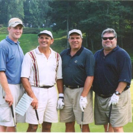Monsignor Bob Cilinski (second from right), a faith leader in Northern Virginia, at the Gabriel Homes Golf Tournament.
