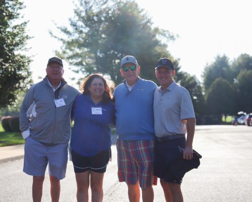 (Left to right) Jack Mannion, Michele Bolos, Michael Holupka, and a golfer at the annual Gabriel Homes Golf Tournament.