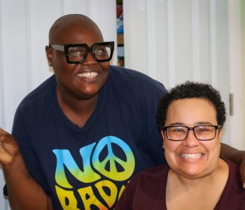 Pierrein (left), residential counselor, with resident.