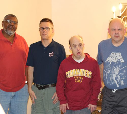 Reuben (left), senior residential counselor, with Gabriel Homes resident.