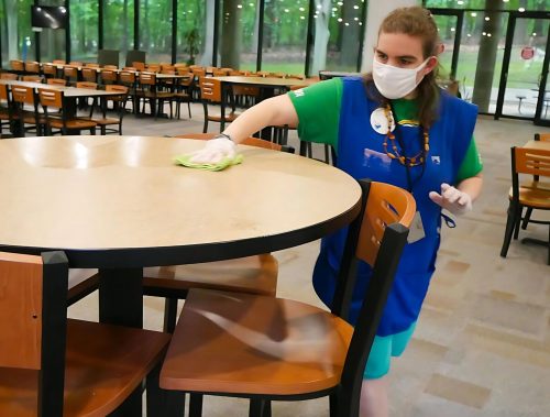 Gabriel Homes resident cleaning cafeteria for work.