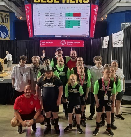 Special Olympics powerlifters with their medals.