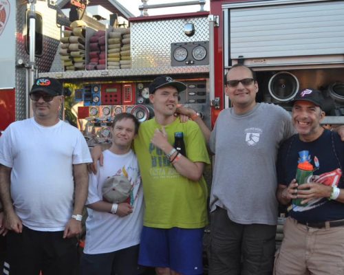 Gabriel Homes resident (second to the left) at summer camp.
