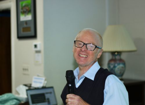 Gabriel Homes resident performing karaoke at the 2025 Spring Fling.