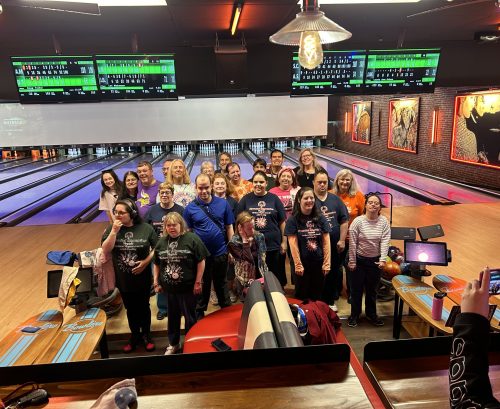 Kendall Heren (back row, left) with Special Olympics athletes.