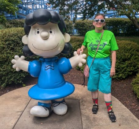 Gabriel Homes resident posing with Lucy at Kings Dominion.