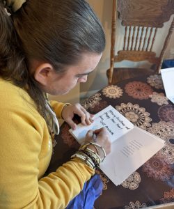 Gabriel Homes resident writing thank you cards.