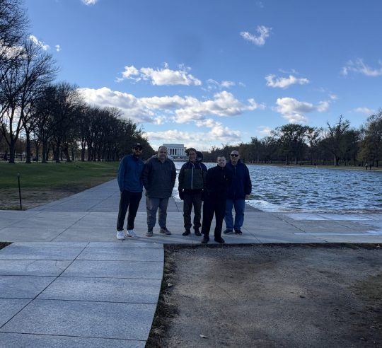 Gabriel Homes residents and staff (left) at the Reflecting Pool during Veterans Day in Washington, D.C.