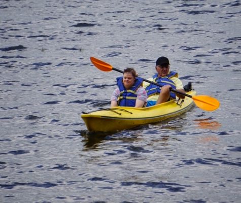 Gabriel Homes resident kayaking on family adventures.