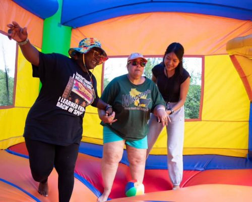 Gabriel Homes resident (center) at Camp Jaycee.