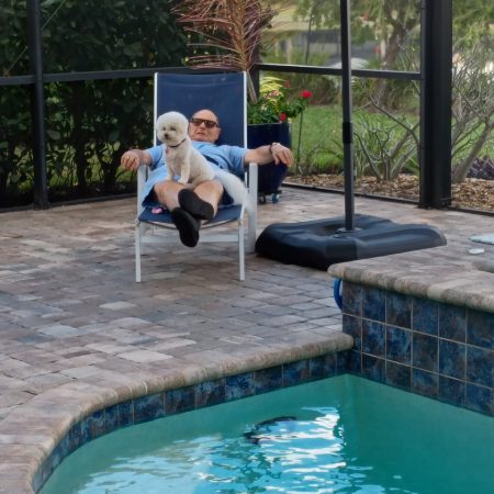Gabriel Homes resident relaxing at a local pool.