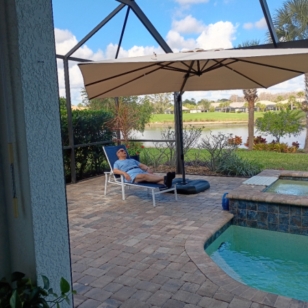 Gabriel Homes resident relaxing at a local pool.